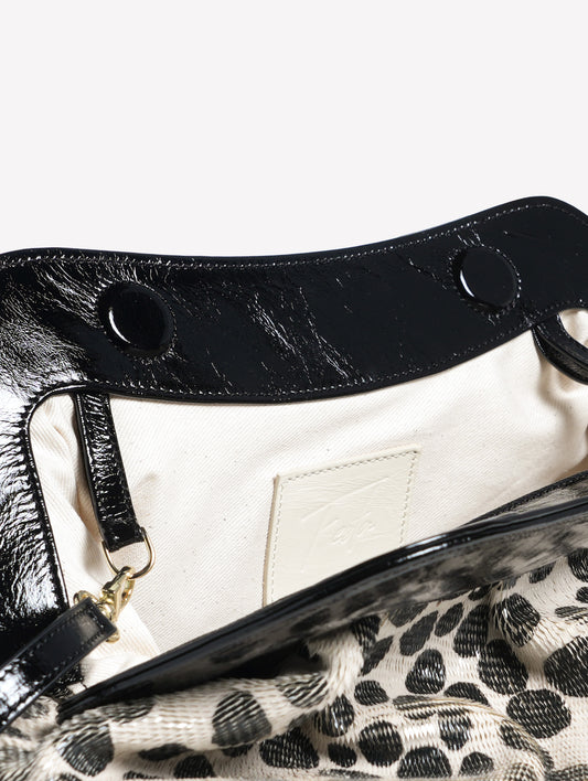POUCH IN PELLE LASERATA CON STAMPA A POIS BIANCO E NERO CON CORNICE IN PELLE NAYARA - bianco_nero | Roberto Festa